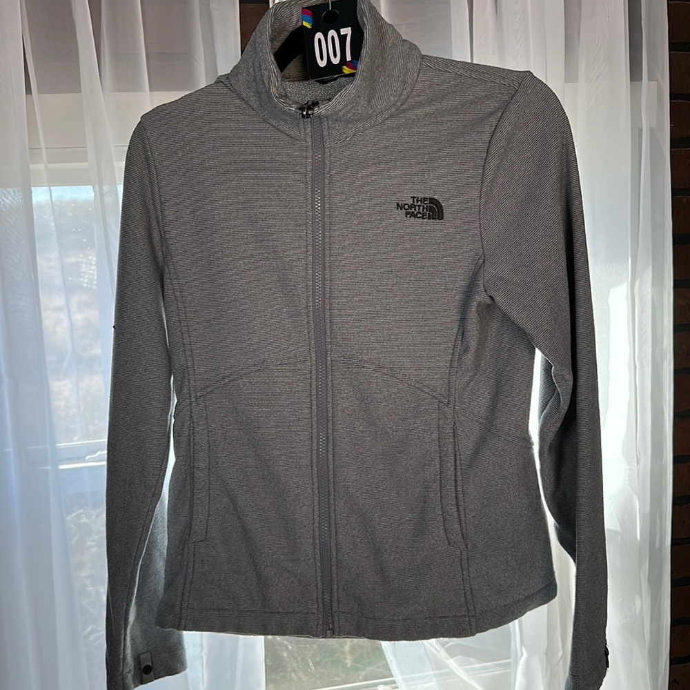 Used The North Face women’s small grey light weight jacket
